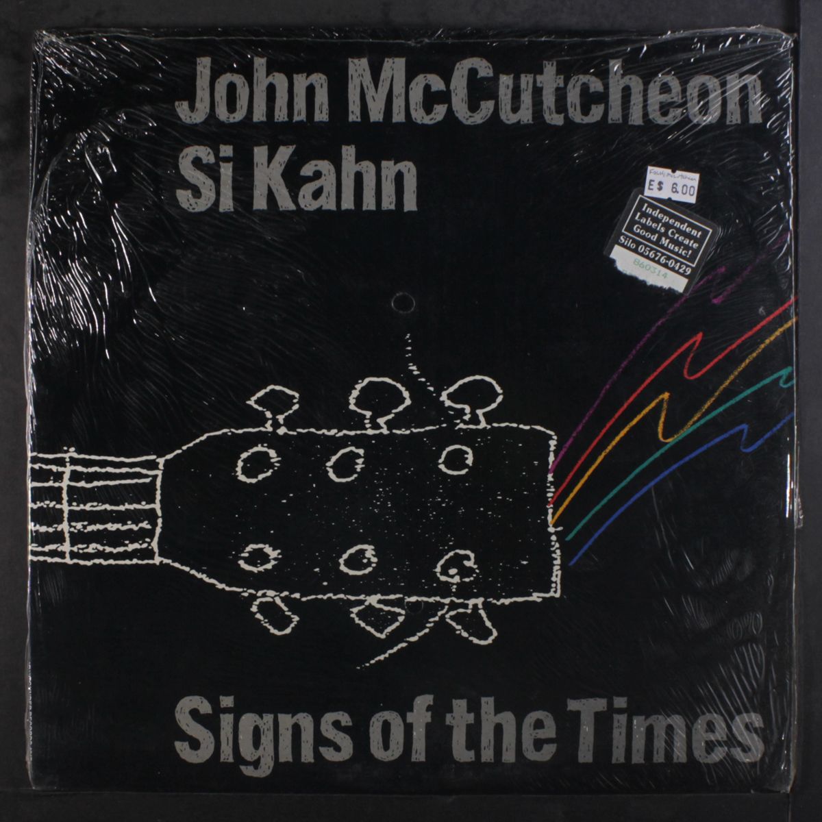 signs of the times by JOHN MCCUTCHEON & SI KAHN