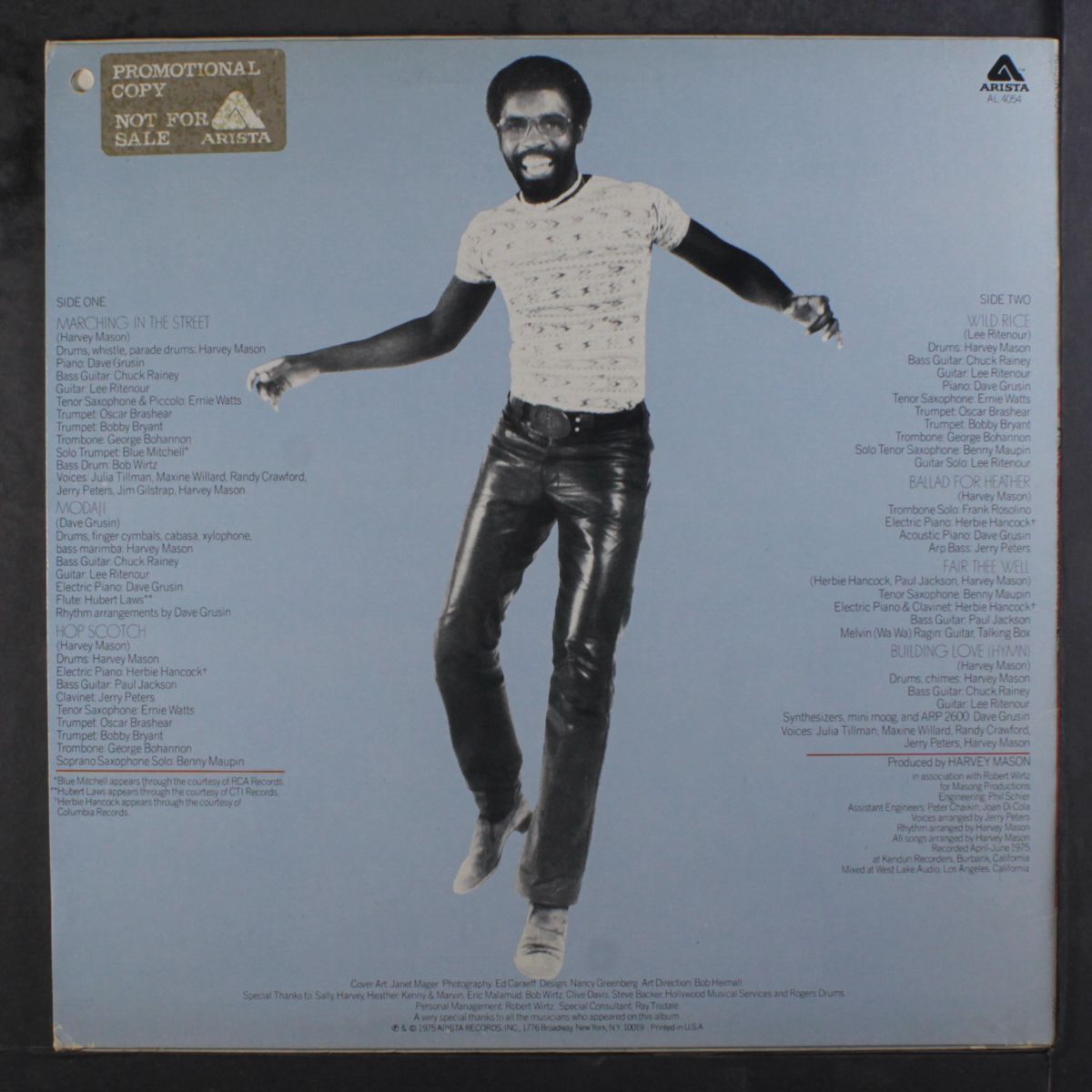 marching in the street by HARVEY MASON