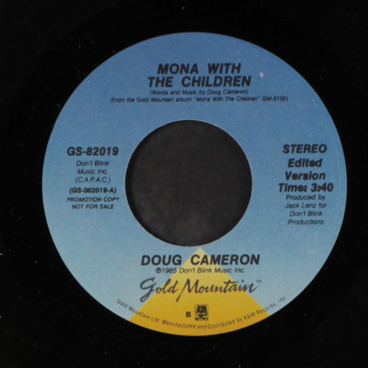 mona with the children by DOUG CAMERON