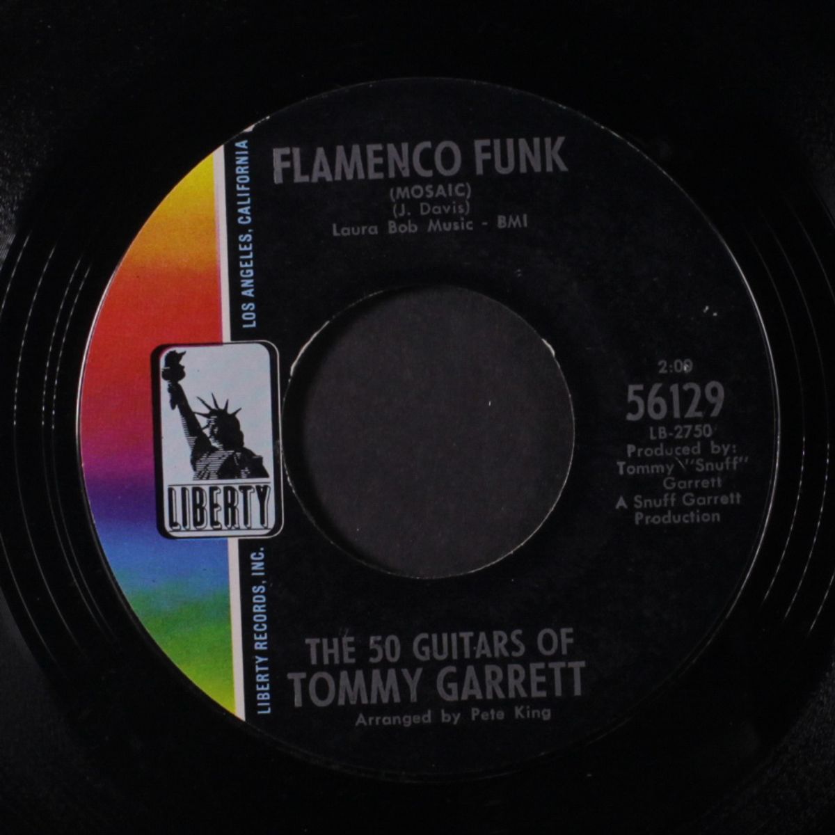 flamenco funk / mexican standoff by 50 GUITARS OF TOMMY GARRETT