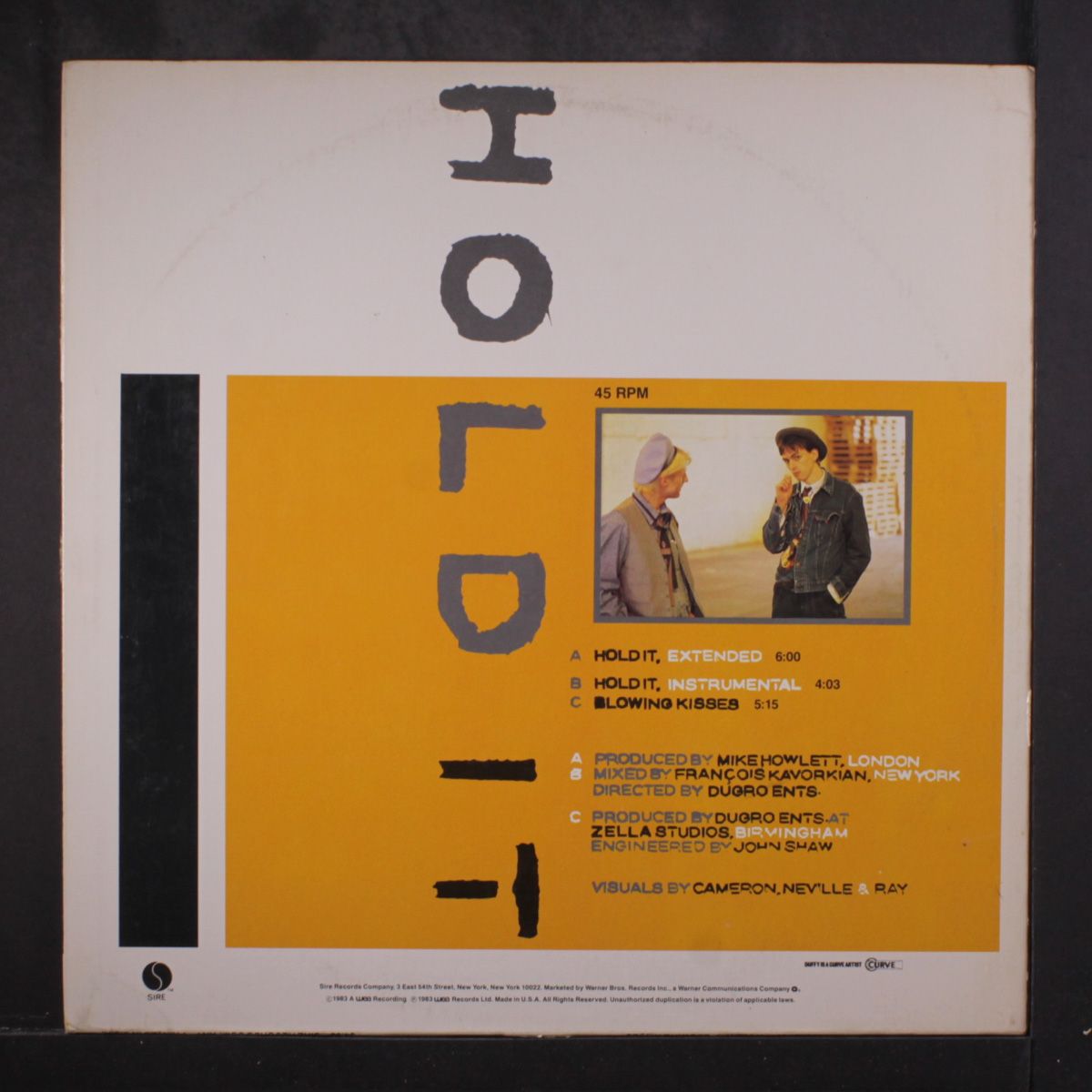hold it / blowing kisses by TIN TIN