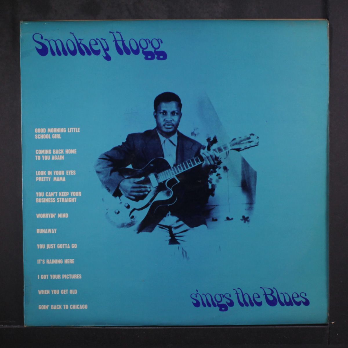 sings the blues by SMOKEY HOGG