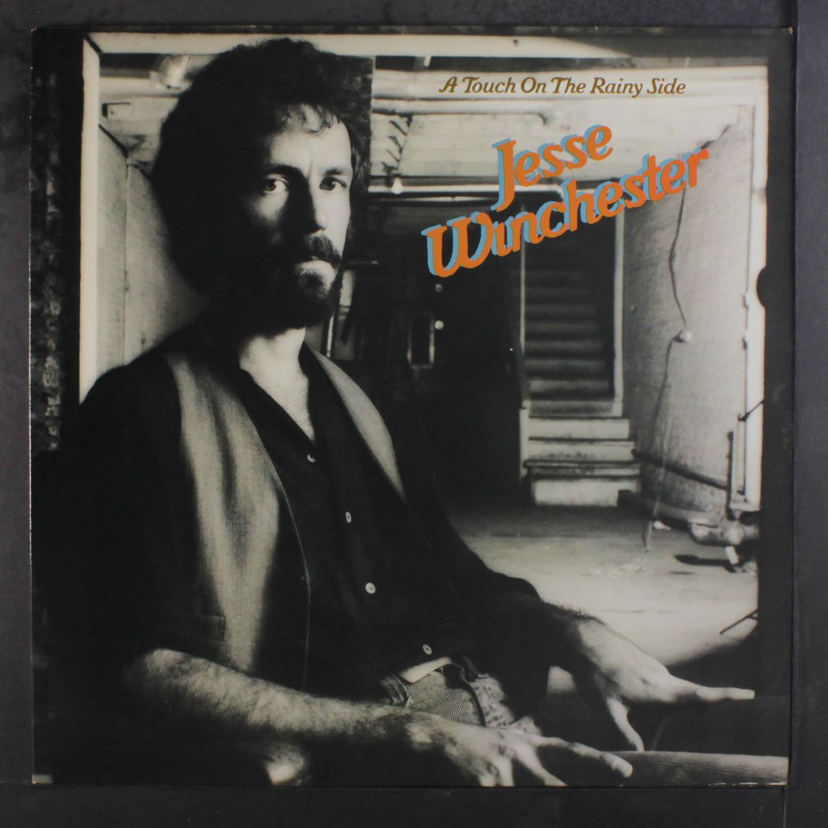 a touch on the rainy side by JESSE WINCHESTER