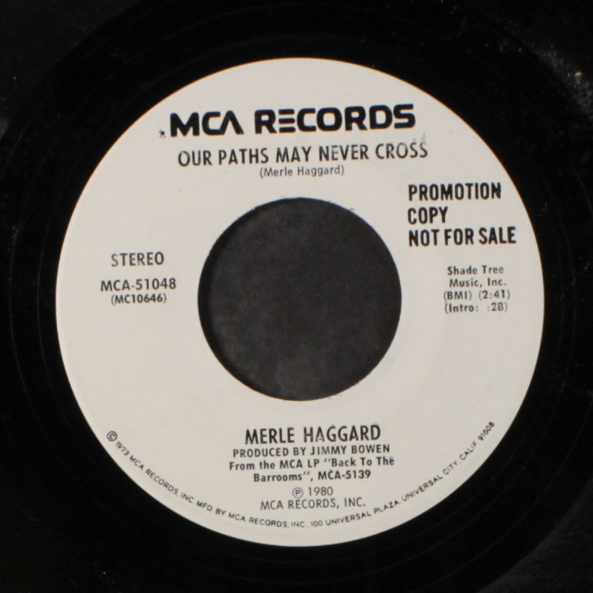 our paths may never cross / leonard by MERLE HAGGARD