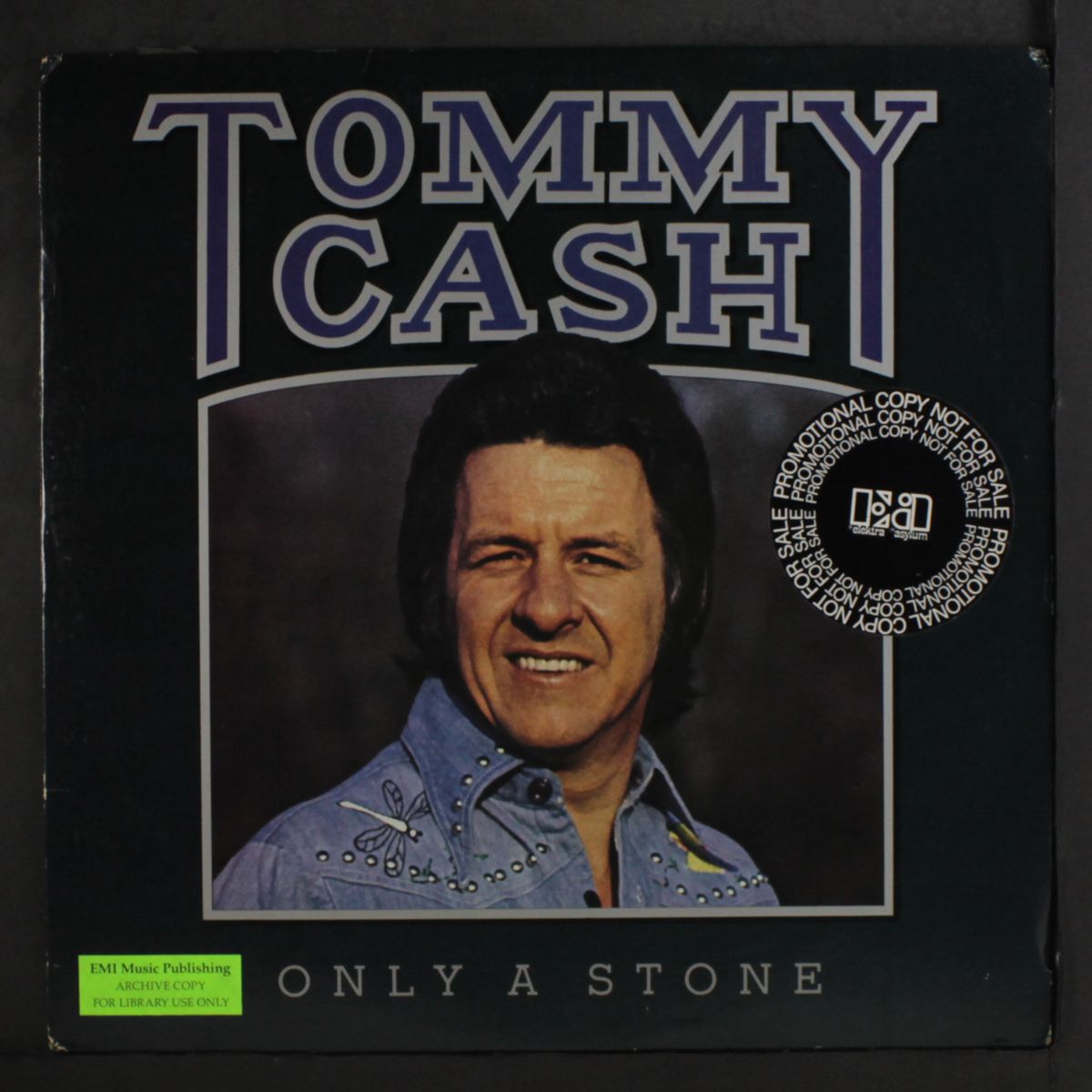 only a stone by TOMMY CASH