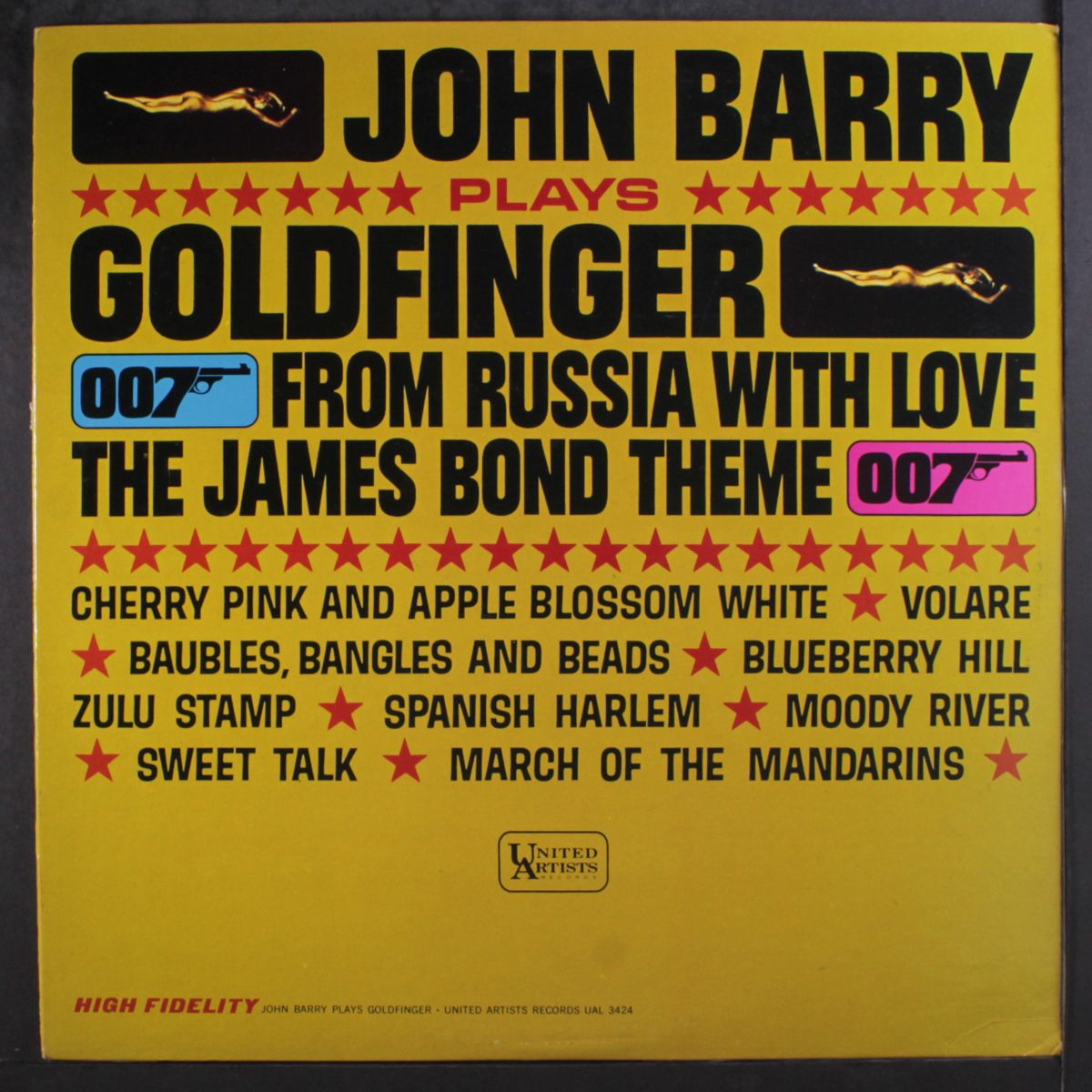 plays goldfinger by JOHN BARRY