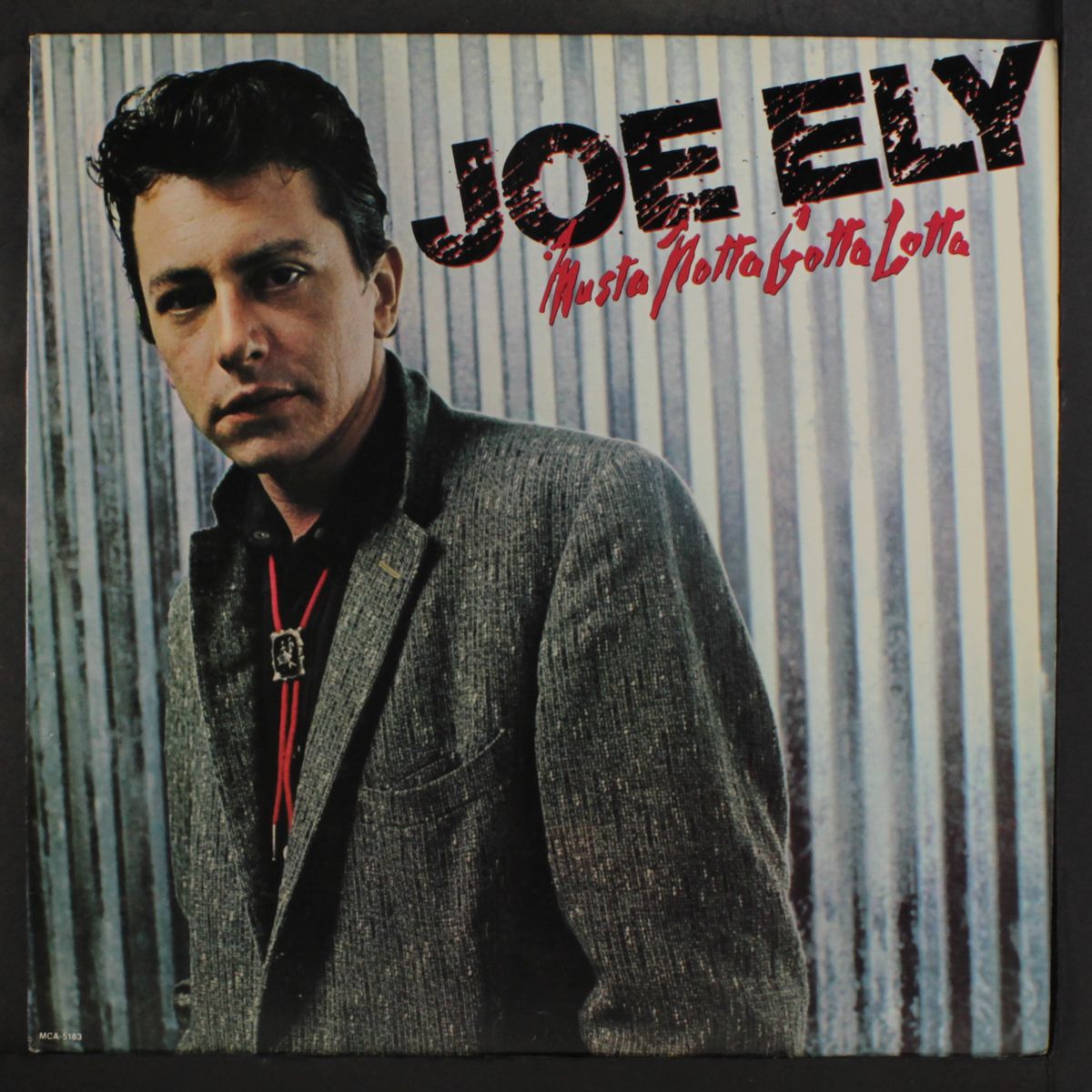 musta notta gotta lotta by JOE ELY