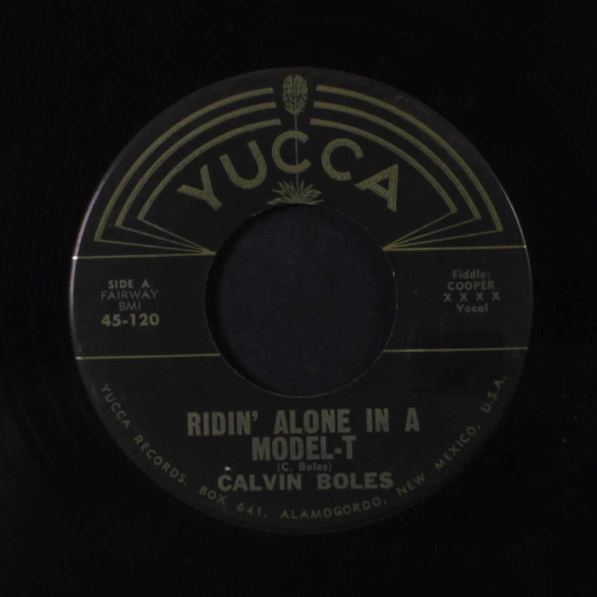 ridin' along in a model-t / down the road i go by CALVIN BOLES