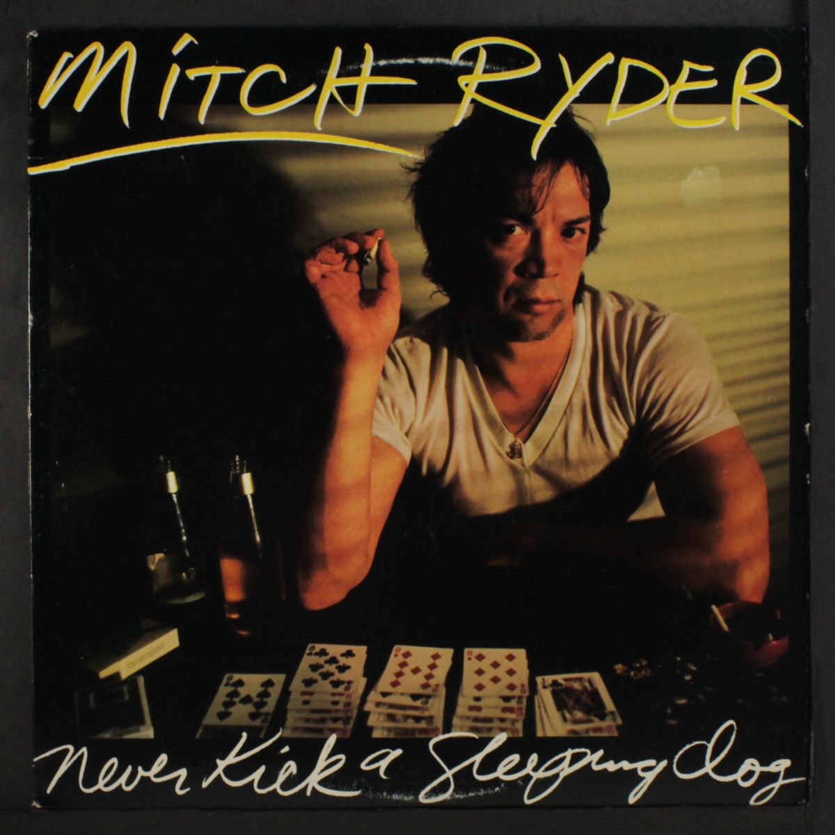 never kick a sleeping dog by MITCH RYDER