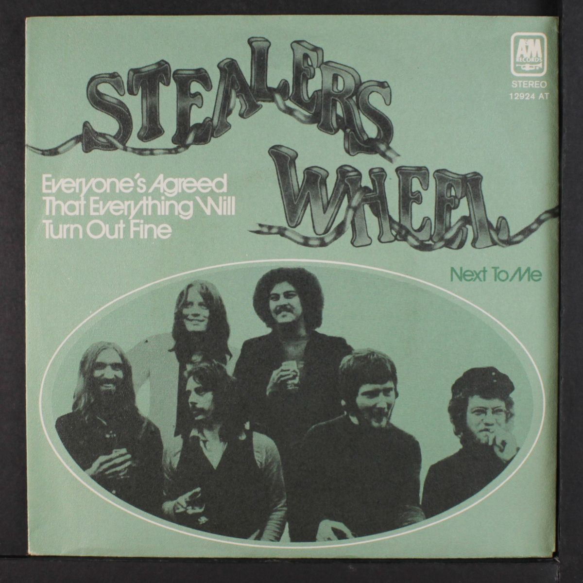 everyone's agreed that everything will turn out fine / next to me by STEALERS WHEEL
