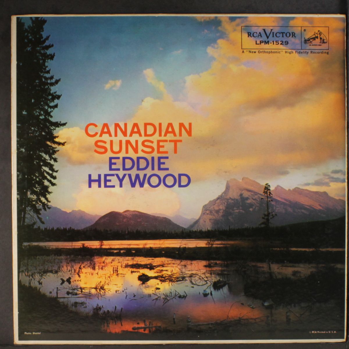 canadian sunset by EDDIE HEYWOOD