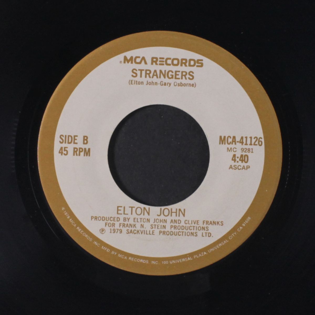 victim of love / strangers by ELTON JOHN