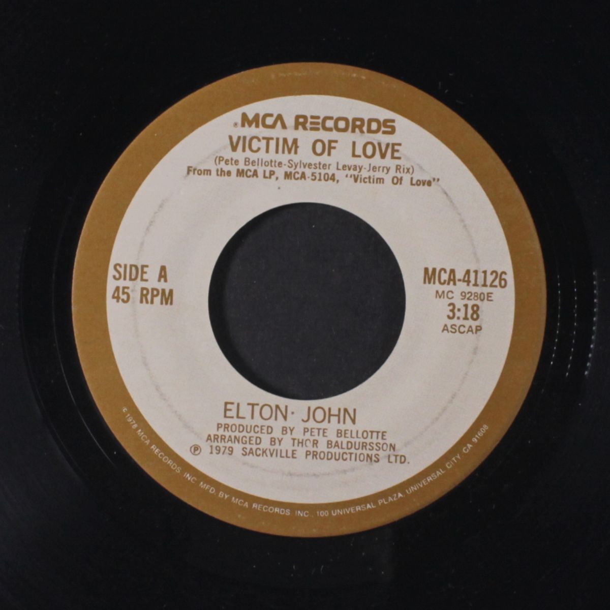 victim of love / strangers by ELTON JOHN