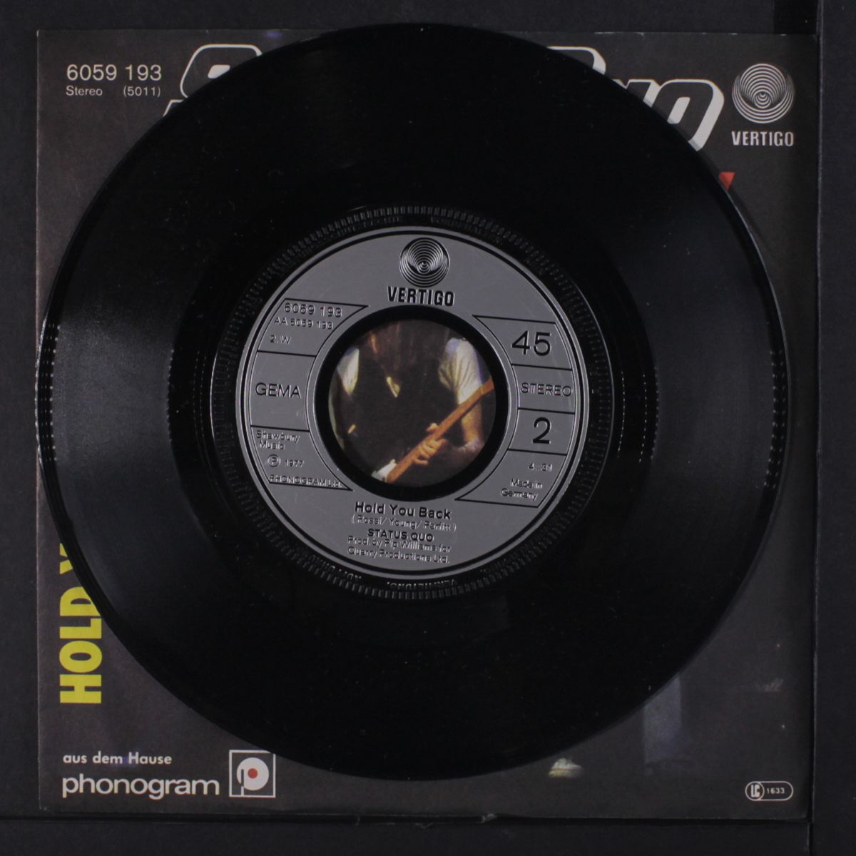 rockers rollin' / hold you back by STATUS QUO