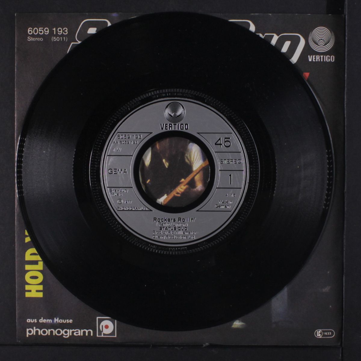 rockers rollin' / hold you back by STATUS QUO