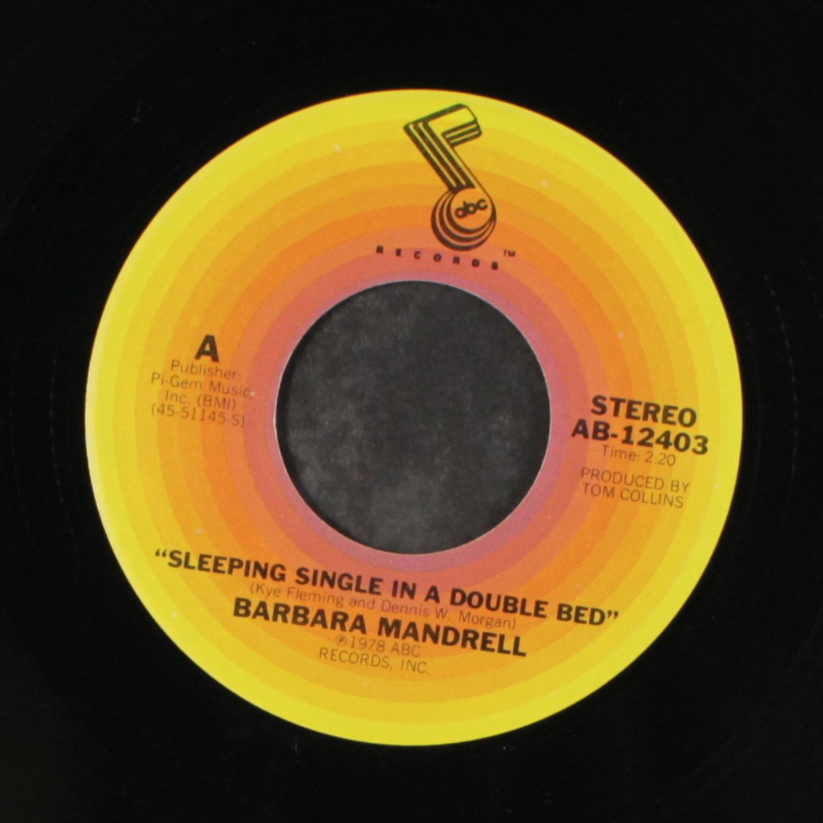sleeping single in a double bed by BARBARA MANDRELL