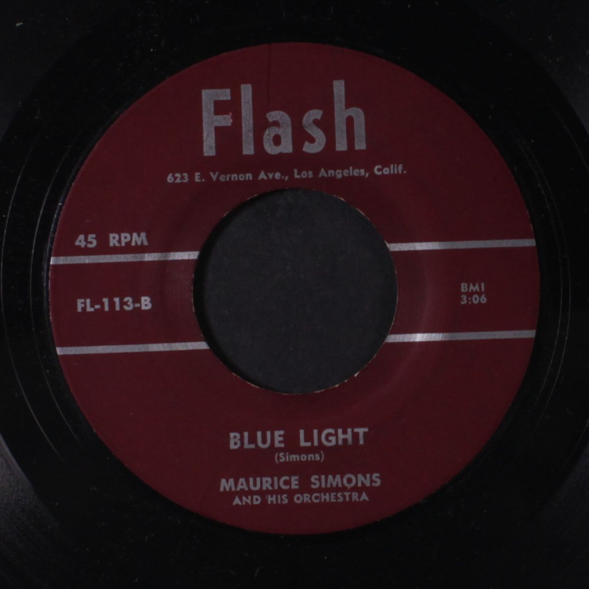 flashy / blue light by MAURICE SIMONS