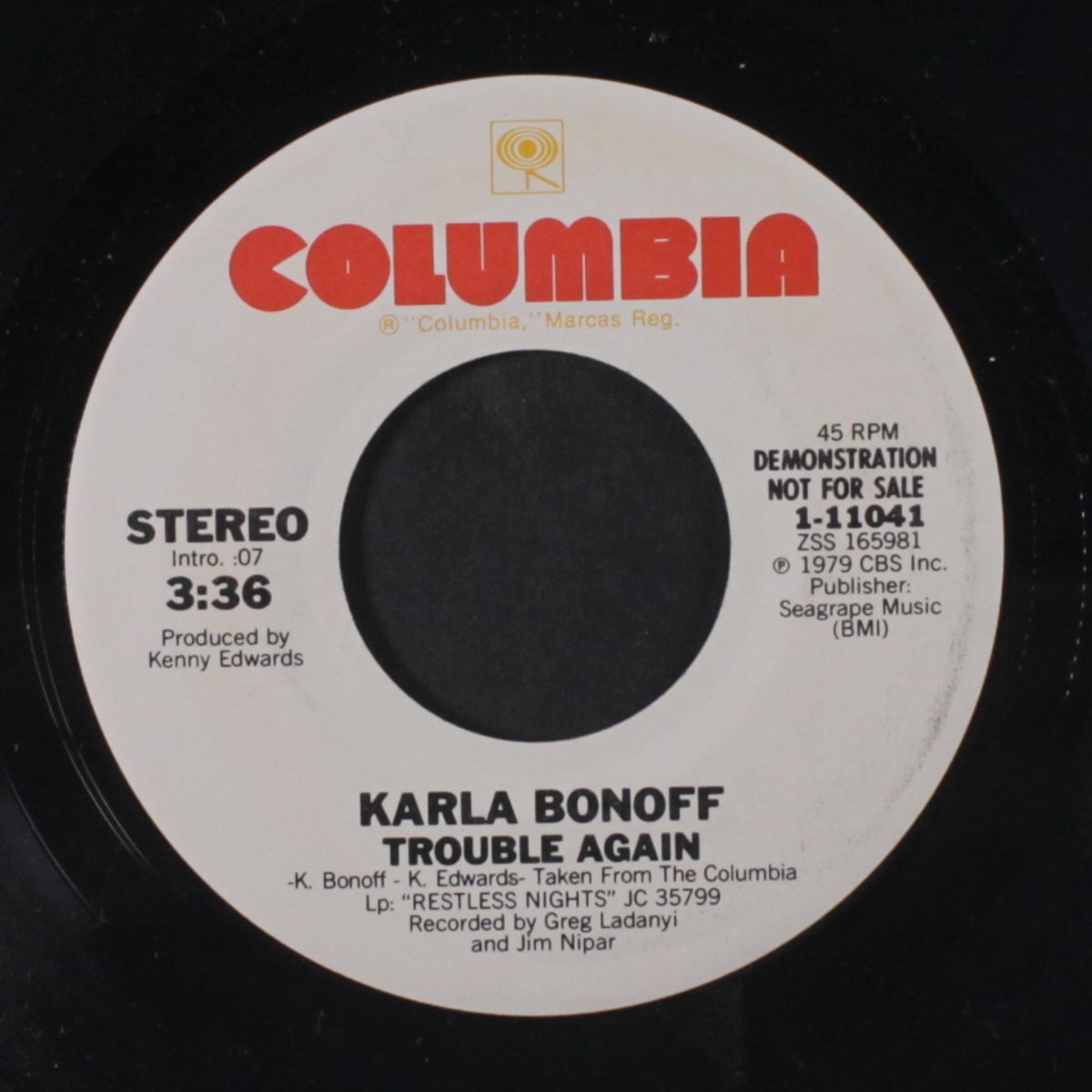 trouble again / if he's ever near by KARLA BONOFF
