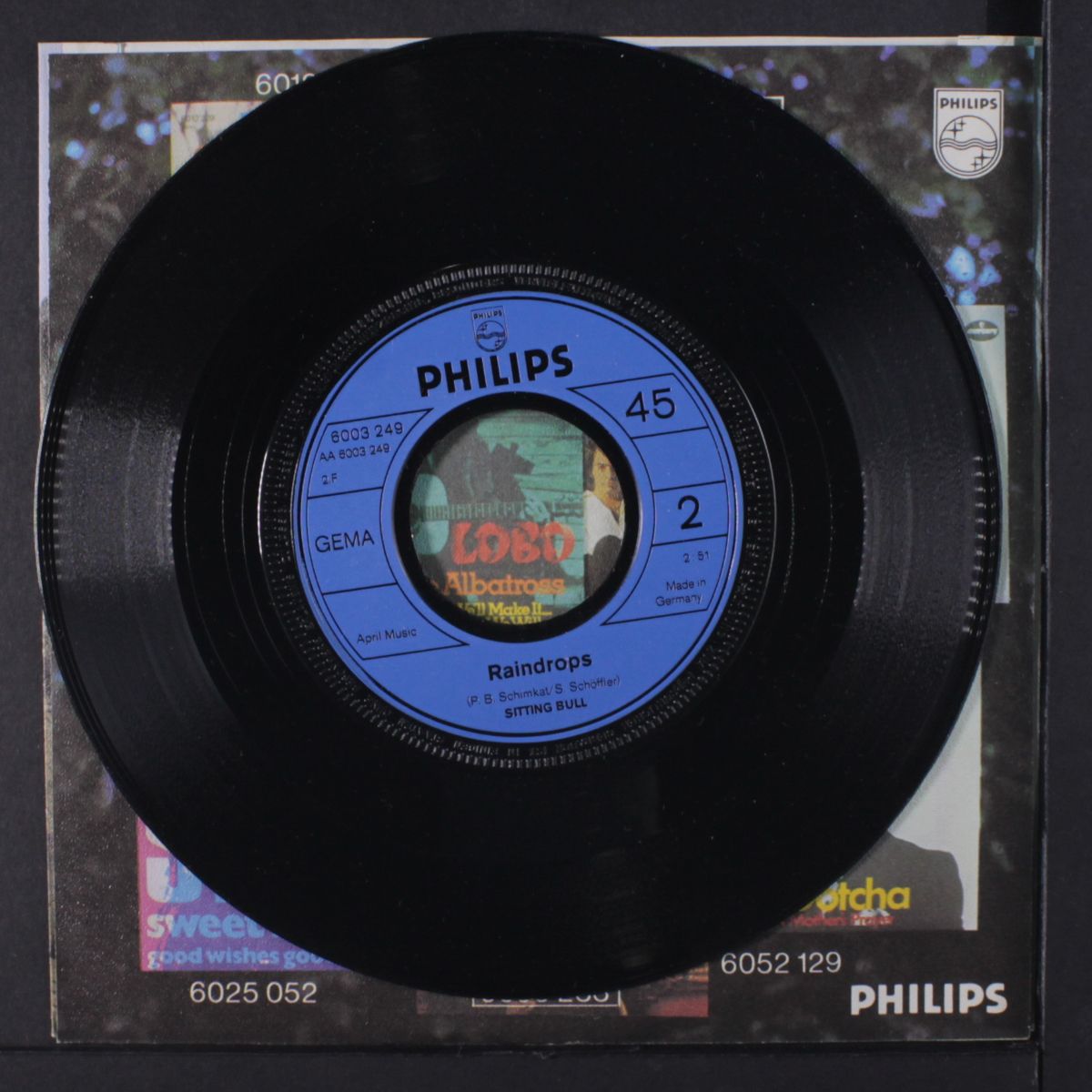 sleepy tom-tom / raindrops by SITTING BULL