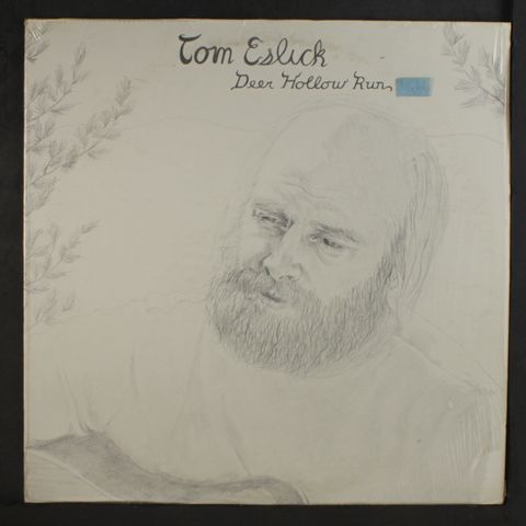 TOM ESLICK