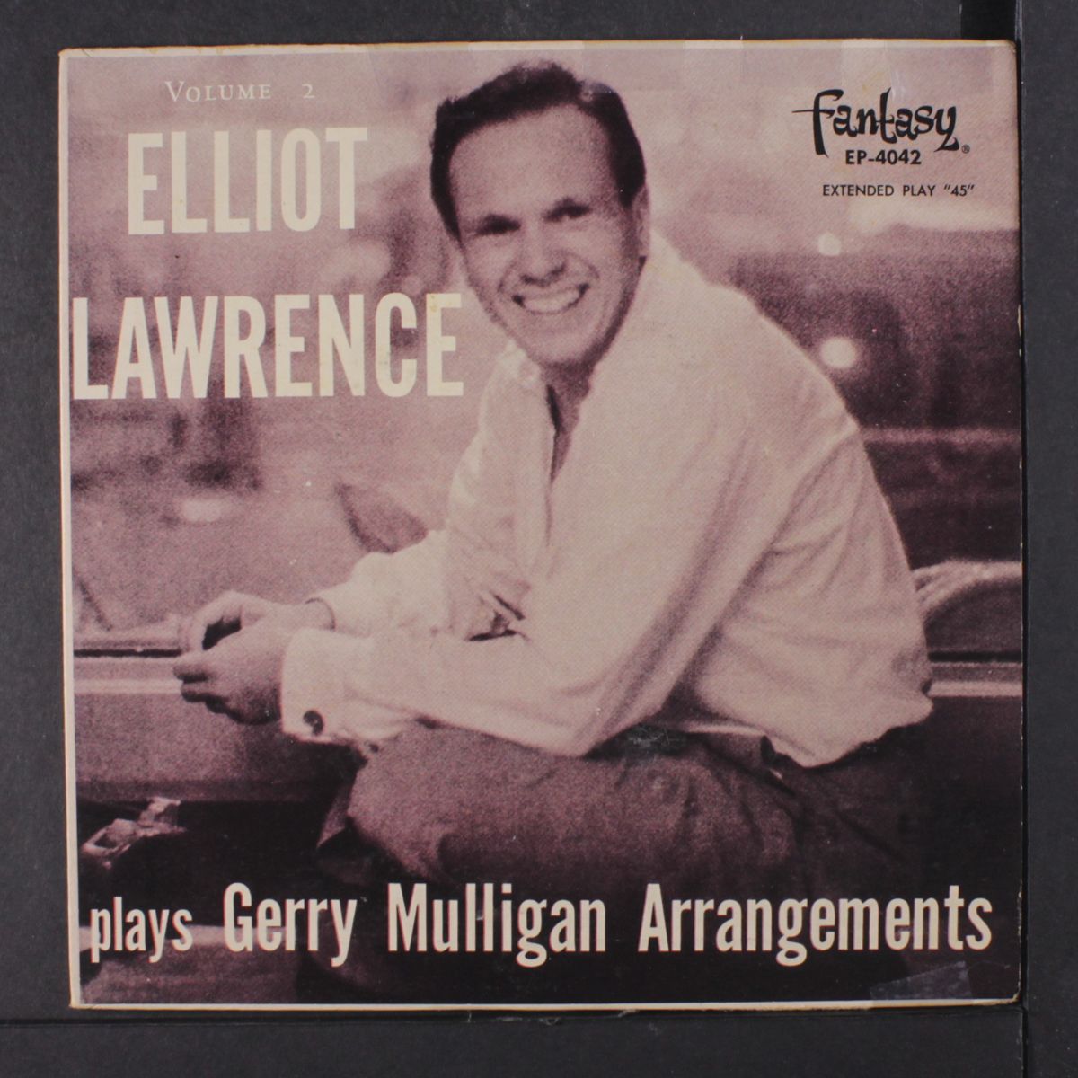 plays gerry mulligan arrangements by ELLIOT LAWRENCE