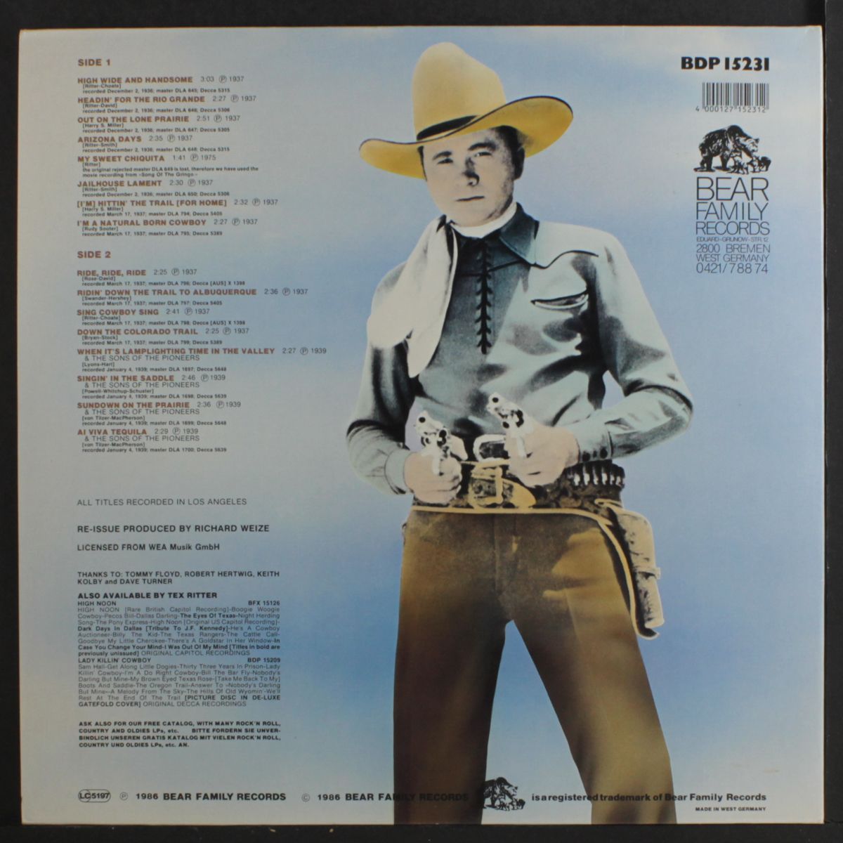 singin'n the saddle by TEX RITTER