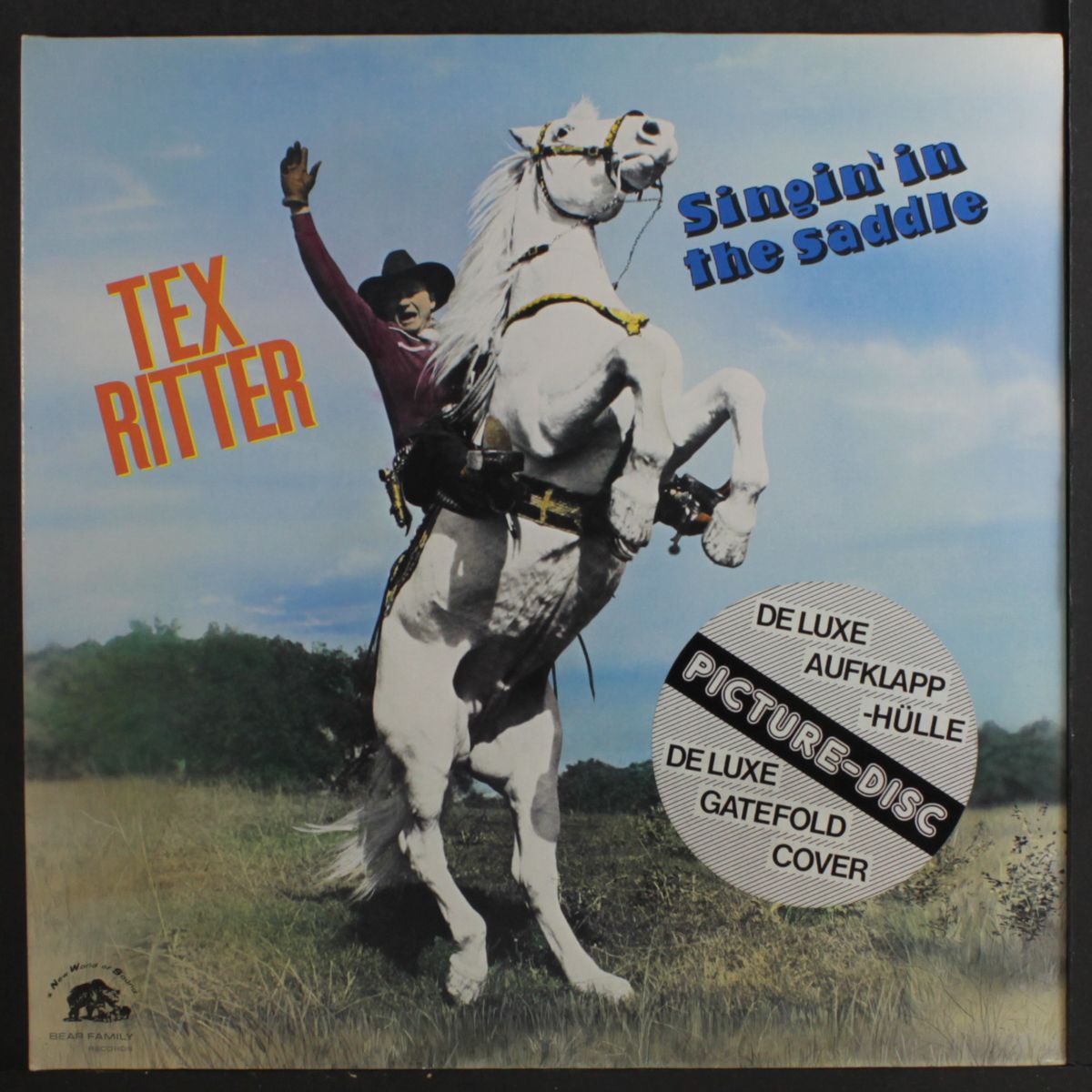 singin'n the saddle by TEX RITTER